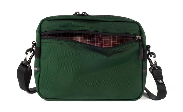 The Side Kick in Wilderness (forest green) 525 Ballistic with Moab (oxblood red with white grid) 200 Halcyon interior.